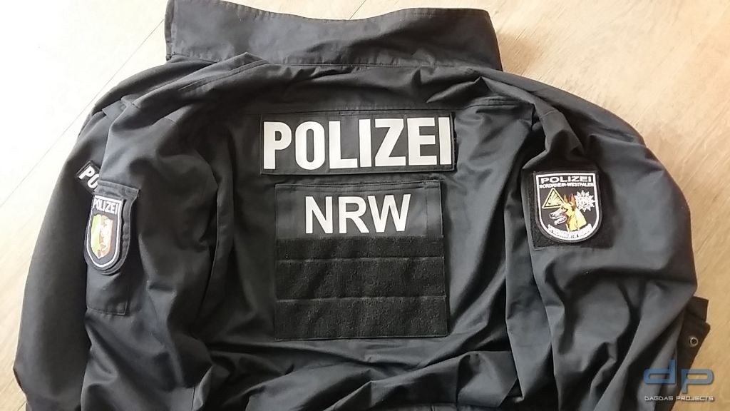 Rückenschild aus 100% Nomex Comfort in parisblau 30x5cm mit Wunschtext in reflex silber